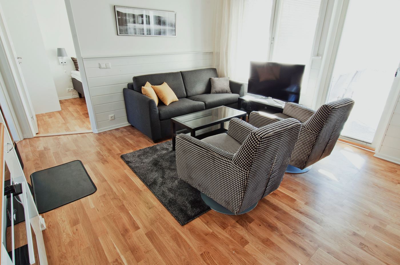 hc_are_apartments_lakeside-cottage_living-area_6731_tbwa_retouched_03_2023.jpg